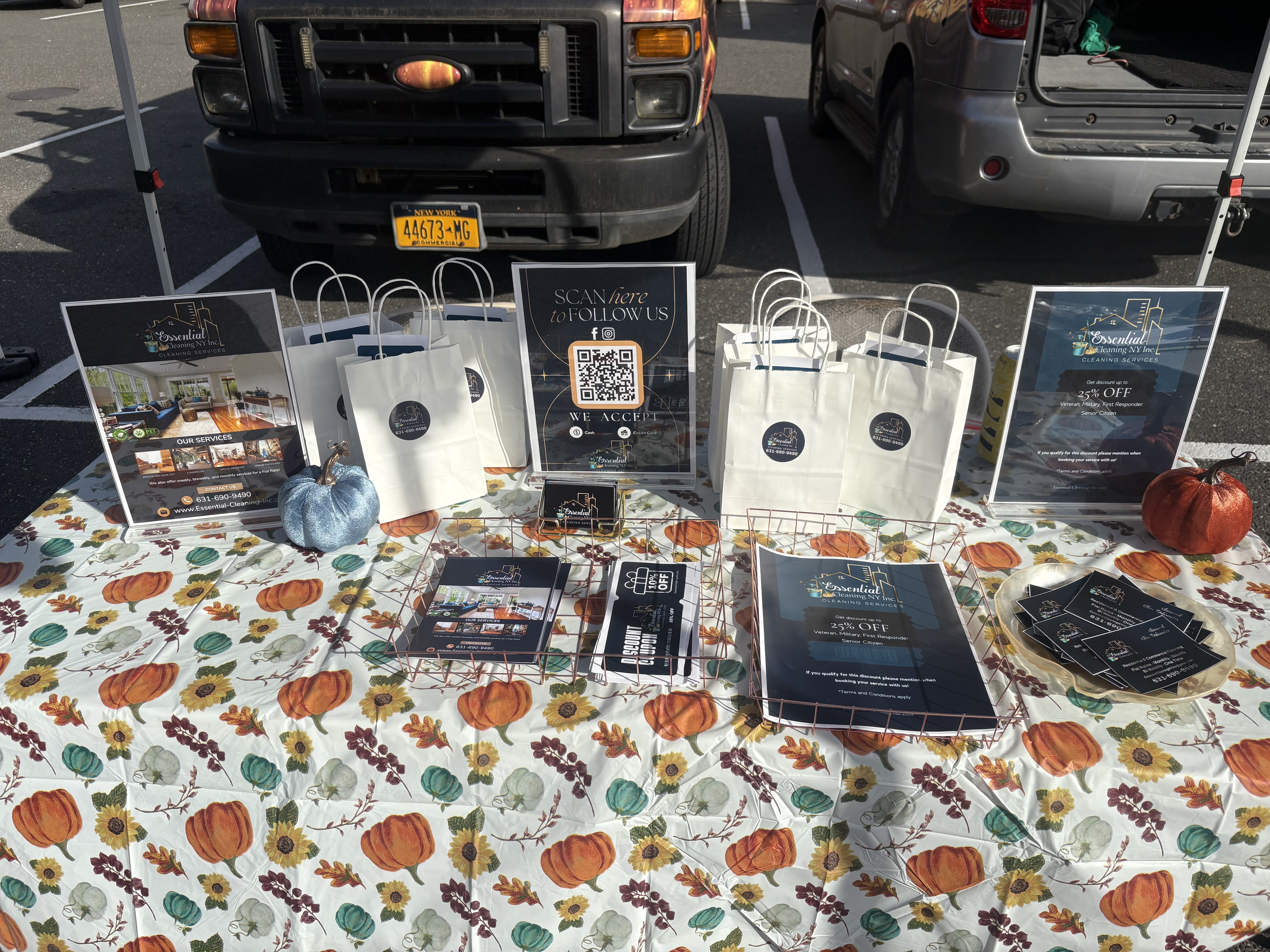 Team greeting visitors at the car show